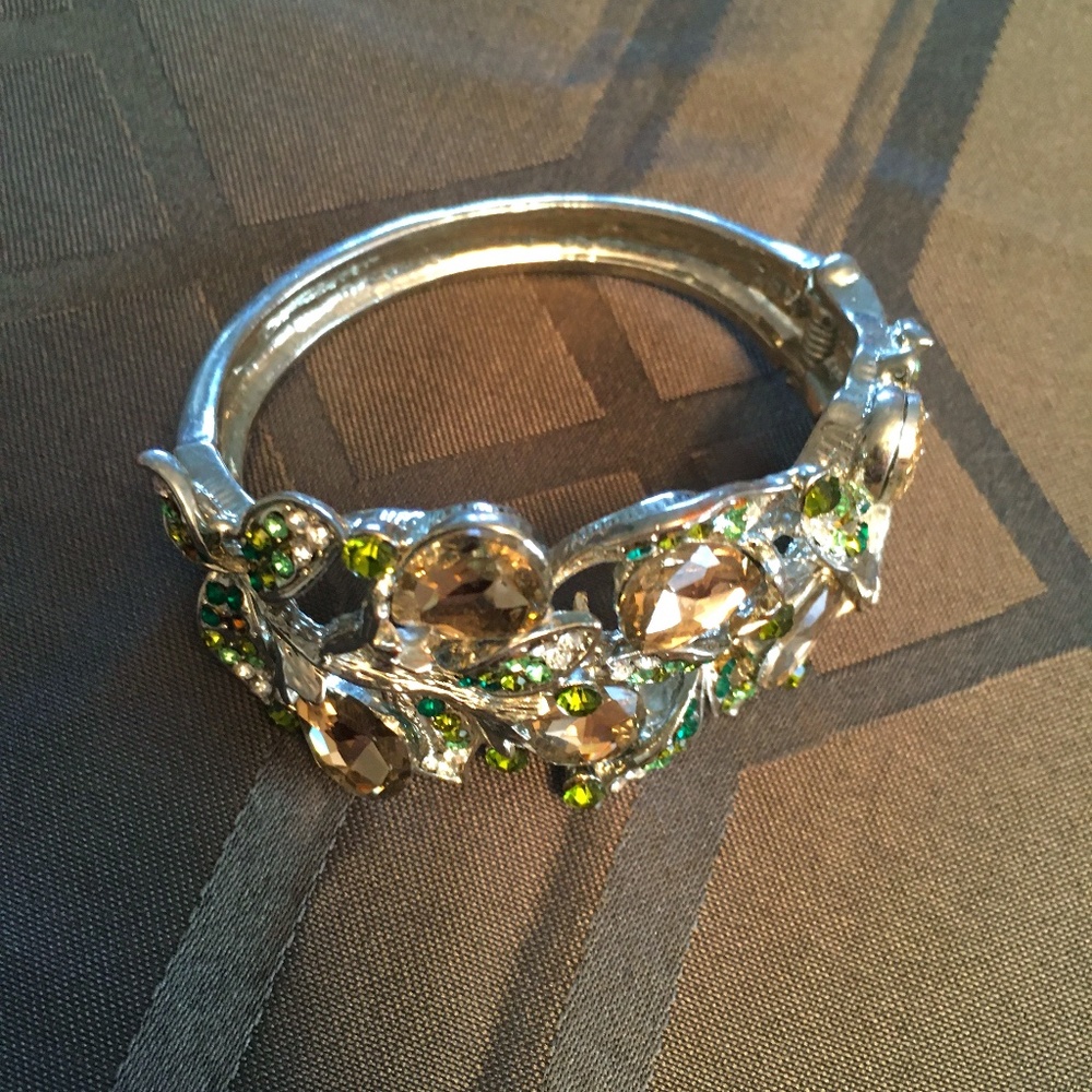 Women's dressy bracelet.  Silver with gemstones. Dresses up any outfit!